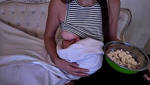 Stepmother gently breastfeeds her adult stepson in intimate roleplay moment