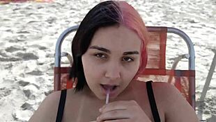pregnant teen belle seduces beach crowd with her fetish belly
