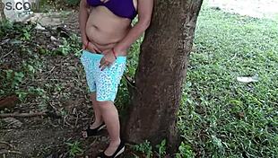 Curious stepmom explores alone in the forest with natural urges.