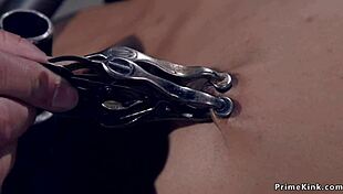 ebony slave squirts in backbend bondage device