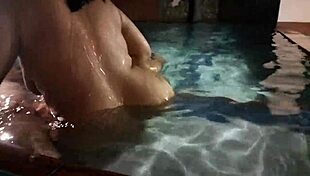 Buddy's mature wife tempts poolside hookup with sneaky thrusts