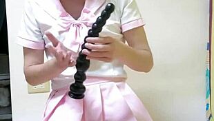 Shoving huge dildo deep into ting xuan's tight shemale anal hole