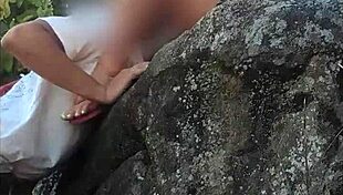 African beauty bares wet pussy outdoors on public beach during steamy massage and oral tease