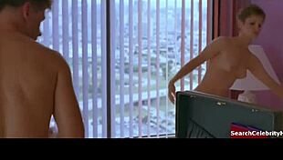 Whoa, Jennifer Jason Leigh flashes her big tits in Miami Blues!