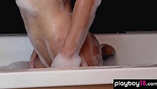 Petite Ukrainian Diana Lark strips in bubble bath