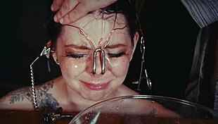 Emo goth teen bound in garage cries as face tied punished roughly with piss