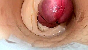 camera shoved deep in shaved pussy catches massive cum blast explosion