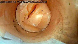 camera shoved deep in shaved pussy catches massive cum blast explosion