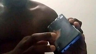 ebony solo climaxes tease phone lens softly