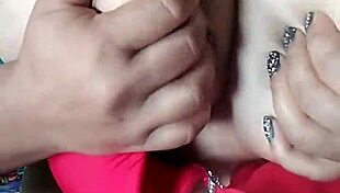 Pornstar Poosoo Squeezes Massive Boobs