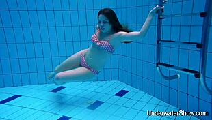sexy teen reveals her perfect nude body swimming underwater in pool