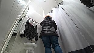 a hidden cam catches fat milf trying on bras and panties in public fitting room 😏👙