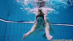 sexy teen reveals her perfect nude body swimming underwater in pool