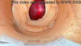 camera shoved deep in shaved pussy catches massive cum blast explosion