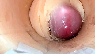 camera shoved deep in shaved pussy catches massive cum blast explosion