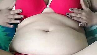 Pornstar Poosoo Squeezes Massive Boobs