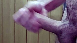 guy strokes big monster cock fresh out shower solo masturbation close up