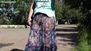 Hairy Mature's Sheer Dress Teases Outdoor View