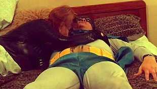 Granny Catwoman Devours Batman's Cock In Fishnet Corset