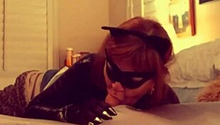 Granny Catwoman Devours Batman's Cock In Fishnet Corset