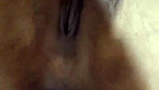 indonesian beauty fingers her swollen lips gently