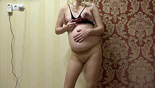 Pregnant milf rams toys into hairy pussy in sexy outfit!