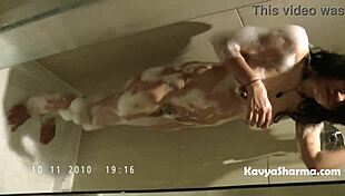 horny desi village aunty kavya fingers pussy in steamy bath