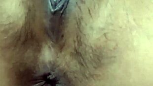 indonesian beauty fingers her swollen lips gently