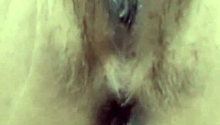 indonesian beauty fingers her swollen lips gently