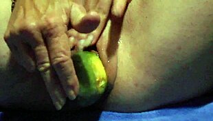 WOW, WATCH HER GAPING PUSSY DEVOUR THAT CUCUMBER!