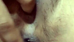 indonesian beauty fingers her swollen lips gently