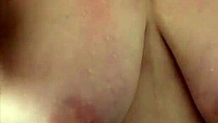 Chubby milf mama soaps up those big natural tits in shower