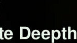 grinning sweetly as the warm surprise lands on her face