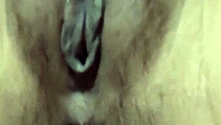 indonesian beauty fingers her swollen lips gently