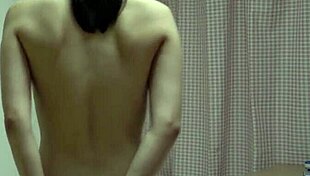 naked japanese girl slips into tight high-cut leotard