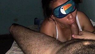 Blindfolded slut slurps big cock sloppily with natural tits bouncing
