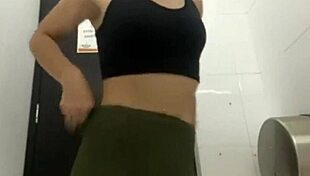 risky latina teen fingers wet pussy publicly in gym shower stall