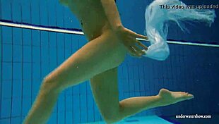 kristy the brunette babe flaunts big boobs underwater in pool