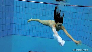 kristy the brunette babe flaunts big boobs underwater in pool