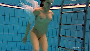 kristy the brunette babe flaunts big boobs underwater in pool