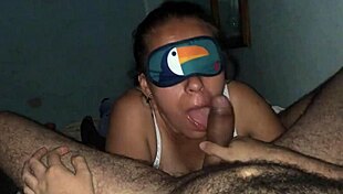 Blindfolded slut slurps big cock sloppily with natural tits bouncing