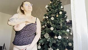 big tits blonde teen rubs pussy by christmas tree twinkling lights