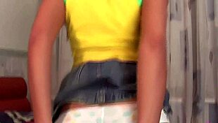 hey, tan brunette denisse b teases her long legs, nipples and natural tits in skirt