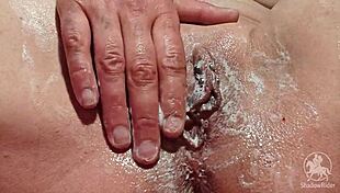 Milf Shaves Her Wet Pussy Lips Close-Up in Bathroom Mirror