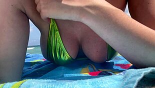 Italian Milf Artemisia's Big Tits Tempt at Beach in Bikini