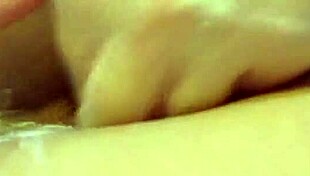amateur brunette milf fists her own tight shaved ass close up