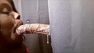 Sloppy ebony deepthroats bbc at gloryhole then swallows cum