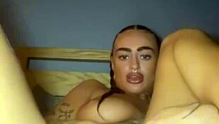 Thick goth teen curiously fingers her own tattooed ass