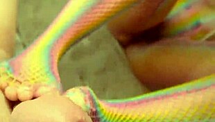 Sexy latina milf in fishnets gives kinky footjob while fingering wet pussy close-up