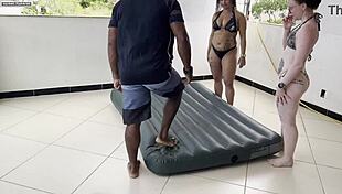 Two Curvy Babes Get Skilled Help Inflating Mattress From Street Stud